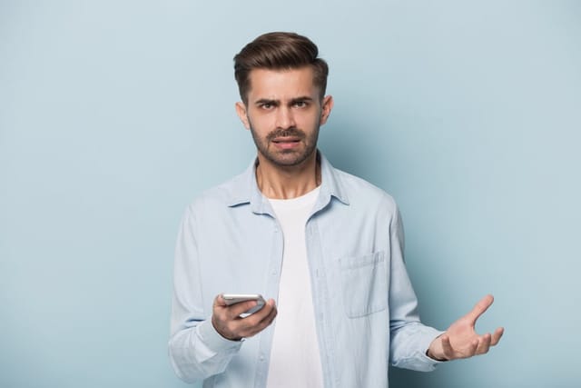 Young man looking passive aggressive.