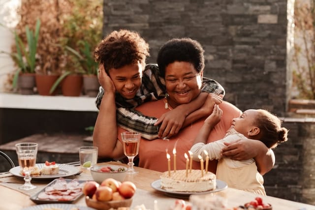 Mother and son celebrating birthday.