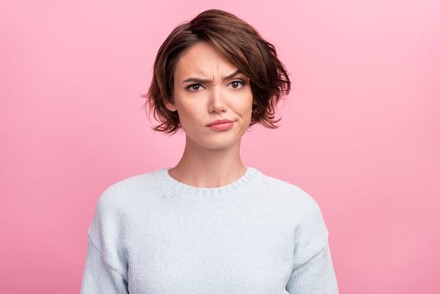 Woman looking skeptical.