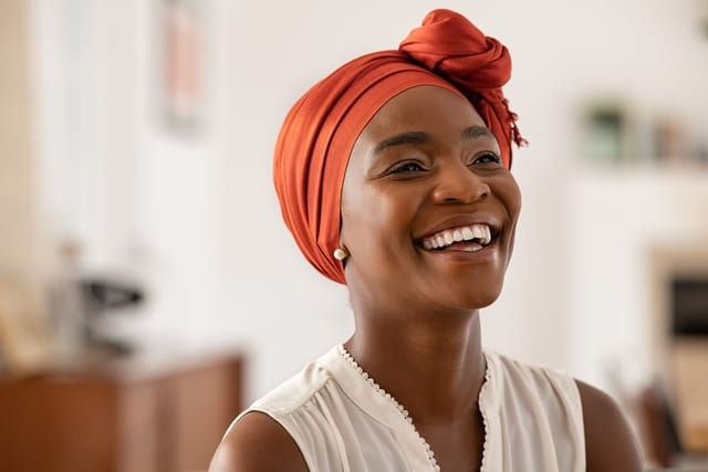 Middle age woman smiling at home.