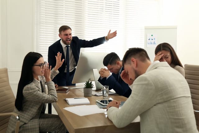 Boss angry at his employees.