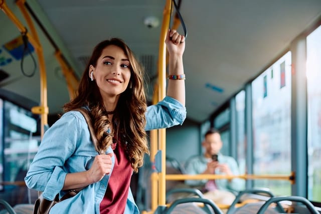 Young woman travelling on a bus.