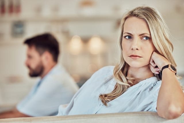 Woman gaslighting her husband.
