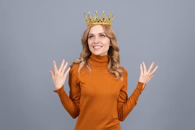 Woman wearing a crown.