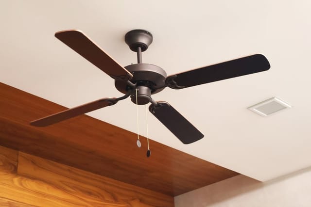 Wooden ceiling fan.