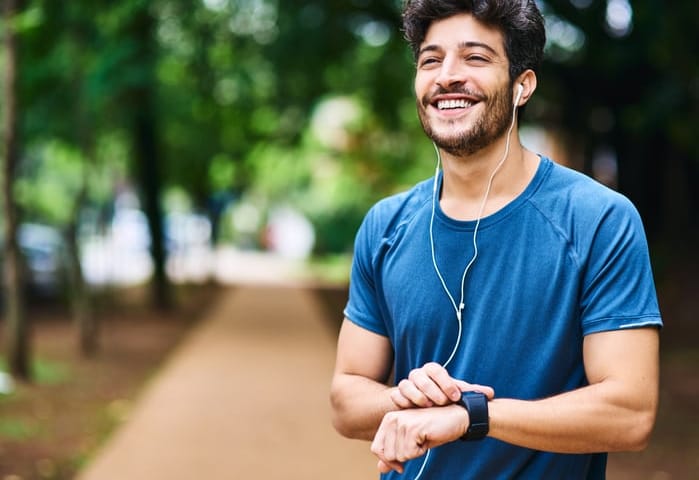 guy out for a run smiling