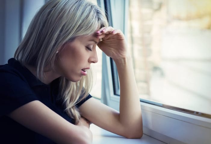 Portrait of depressed young woman.