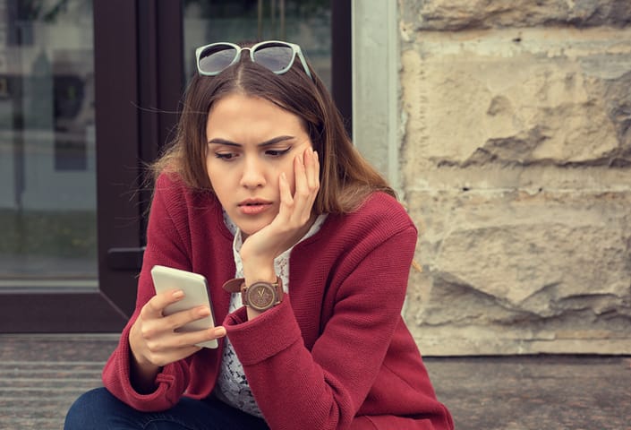 frustrated woman texting