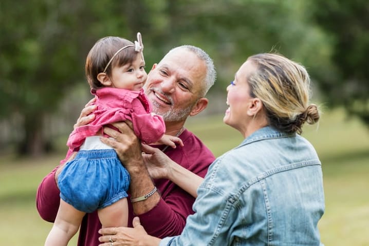 grandparents with baby girl