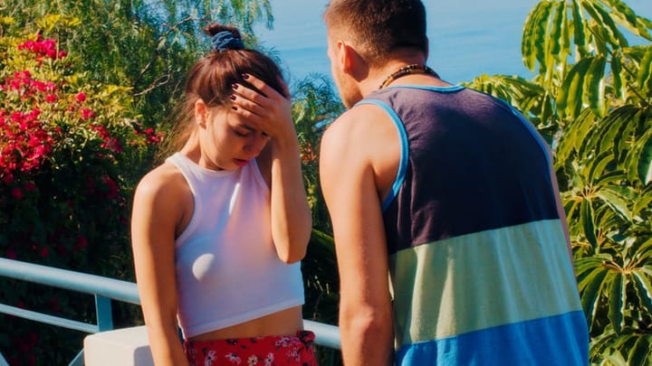 couple arguing on tropical holiday