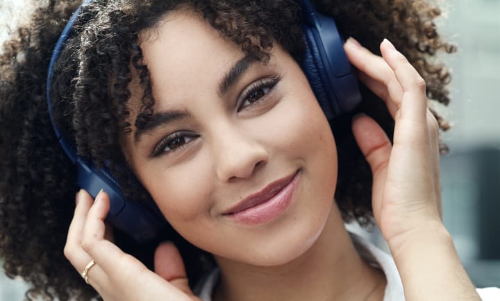 closeup smiling black woman with headset