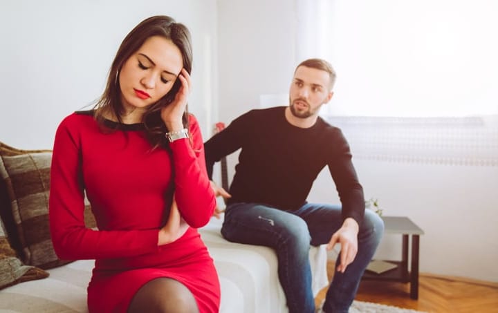 unhappy couple at home