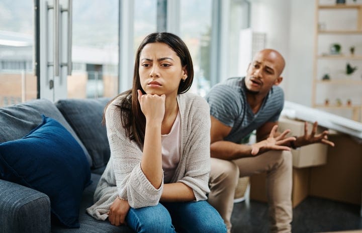 unhappy black couple fighting