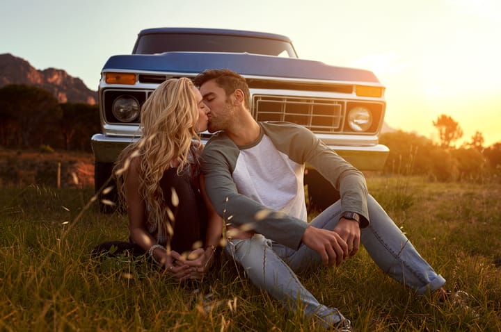 Shot of an affectionate young couple on a roadtrip