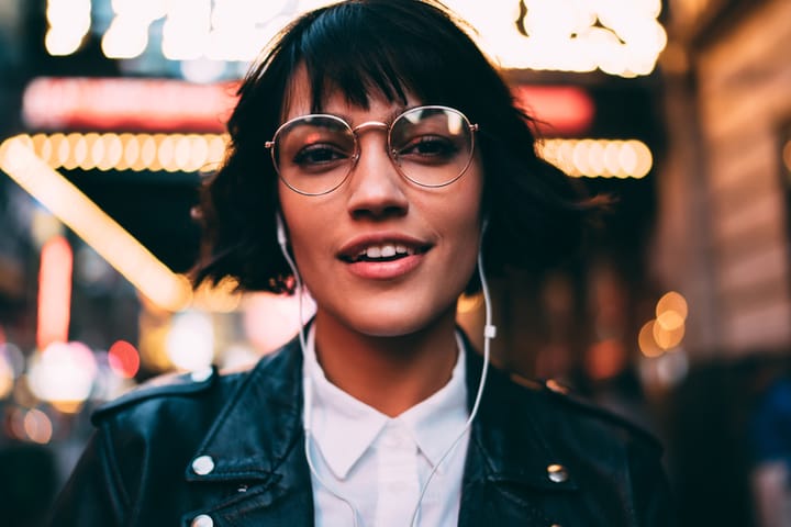 hipster woman with glasses smiling