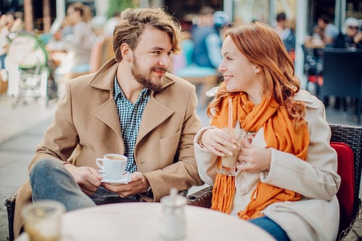 couple outside coffee