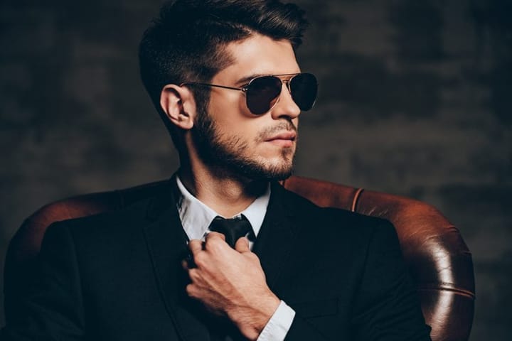 Guy in suit and glasses