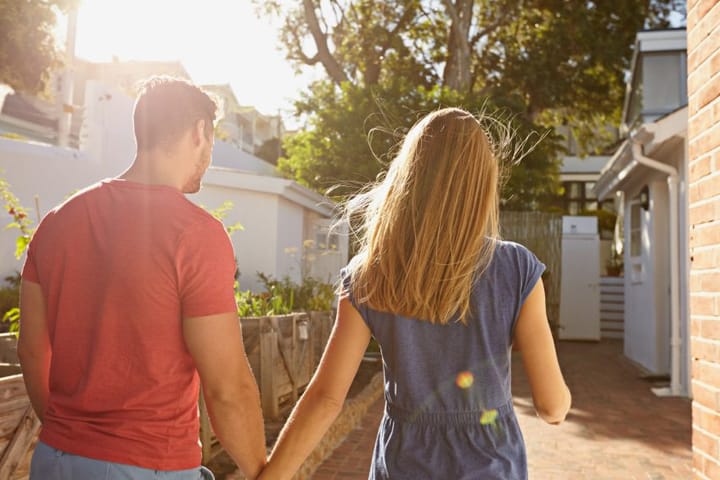 couple walking holding hands