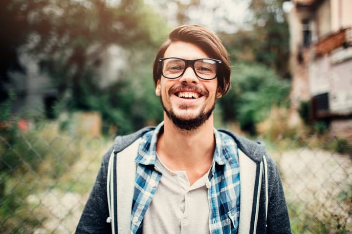 nerdy hipster guy smiling portrait
