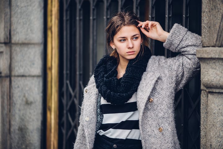 Modern wearing woman walking on the street
