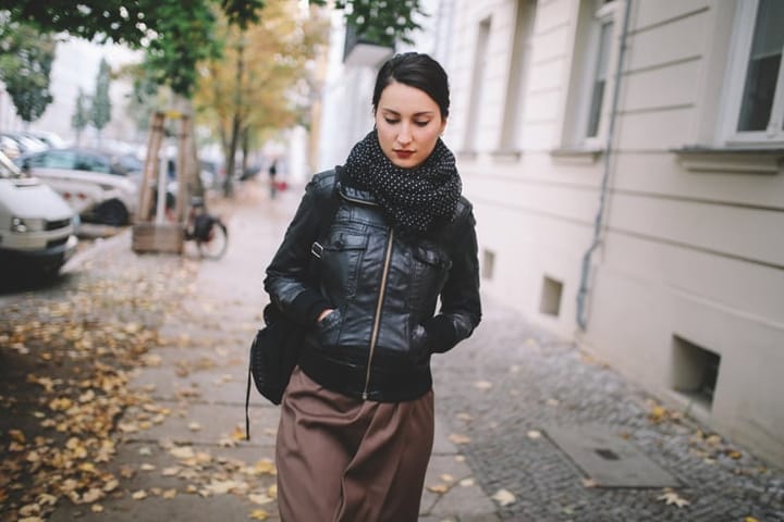 Young woman walking in Berlin Prenzlauer Berg