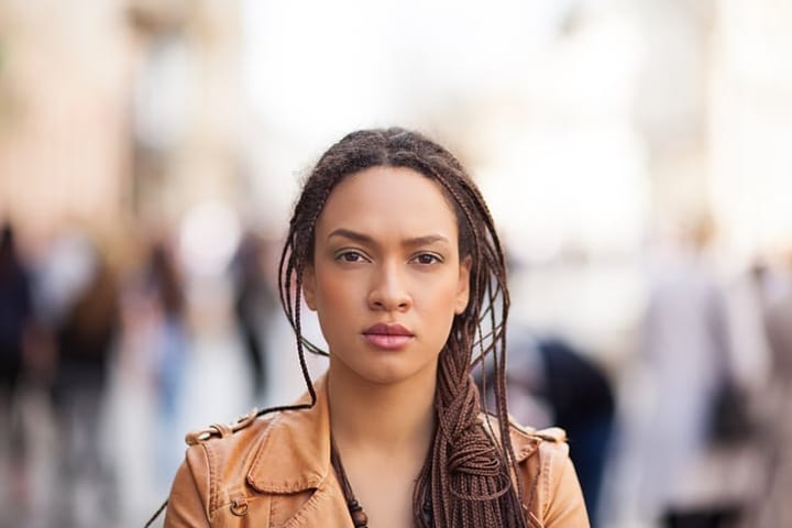 Outdoor portrait of a young African woman.