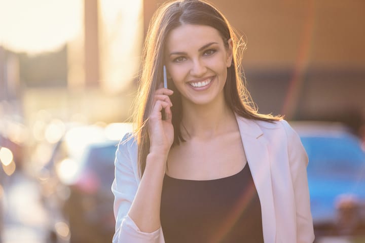 Portraits of businesswoman in the city. Shallow DOF. Developed from RAW; retouched with special care and attention; Small amount of grain added for best final impression. Adobe RGB color profile.