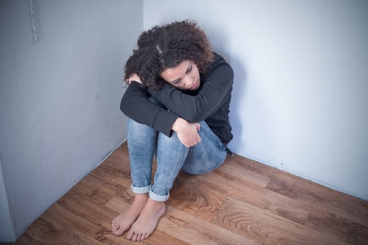 Sad and lonely black girl feeling depressed