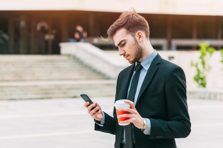 Man texting on phone