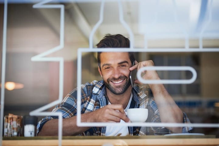 Staying connected during his coffee break