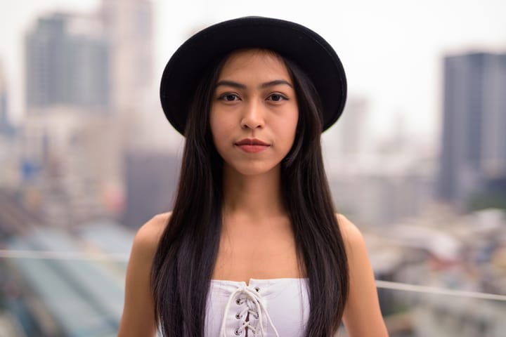 Portrait Of Young Asian Woman From Thailand