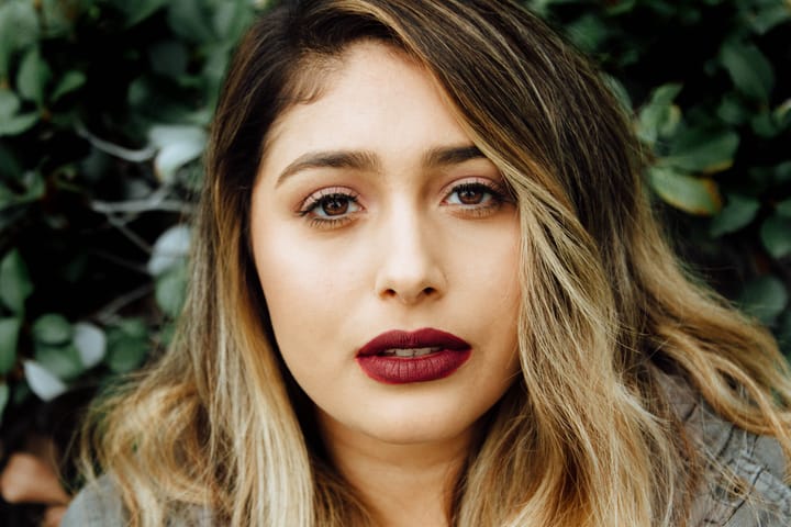 close up girl red lipstick