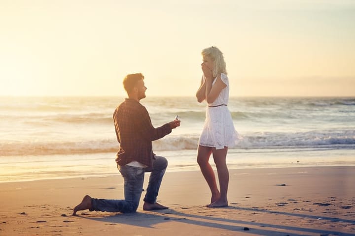 couple proposal beach