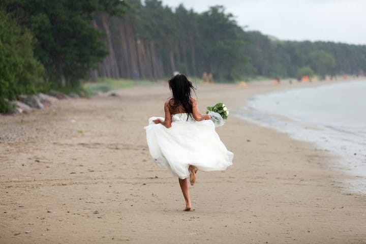 Bride on the beach at her wedding
