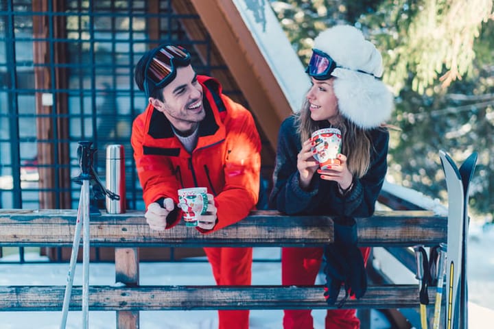 couple on ski trip outside