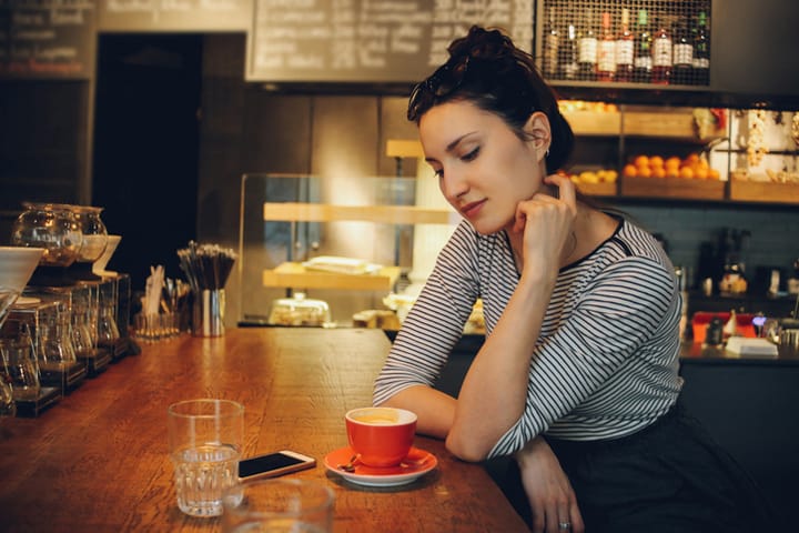 Young woman enjoying a coffee break