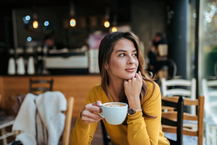 smiling woman at coffee shop