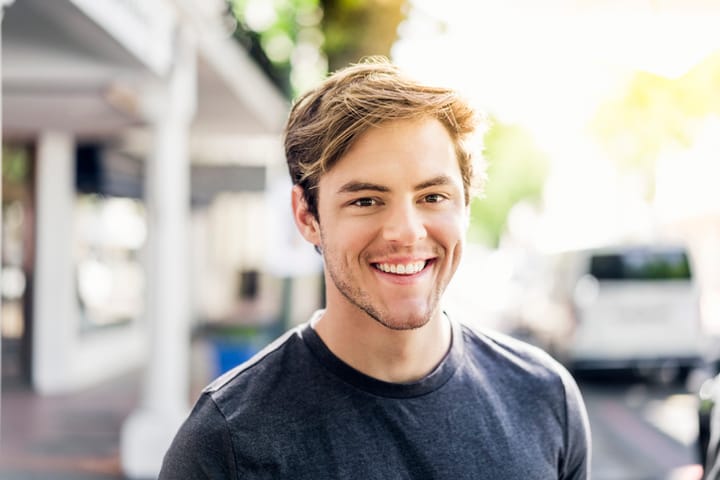 smiling guy outside