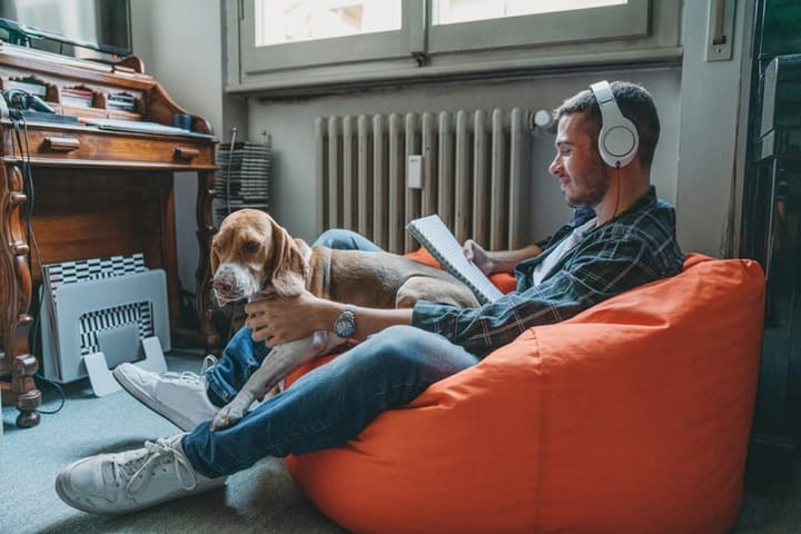 guy at home with his dog