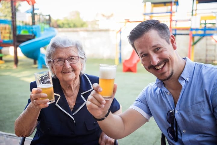 guy toasting with his mom