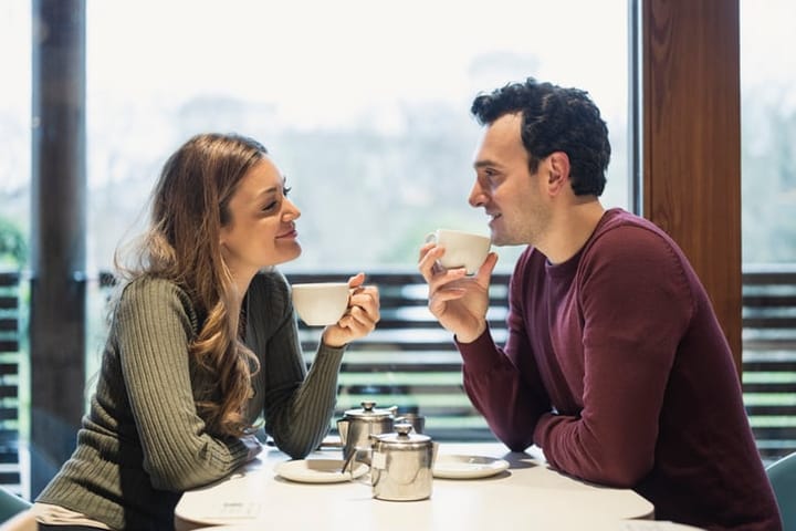 couple on a date enjoying coffee