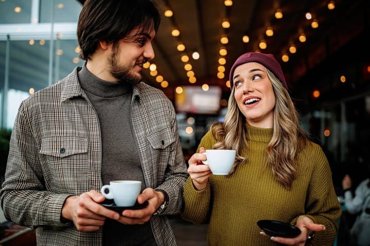 attractive couple having coffee together