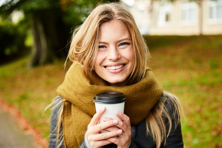 smiling blonde woman coffee
