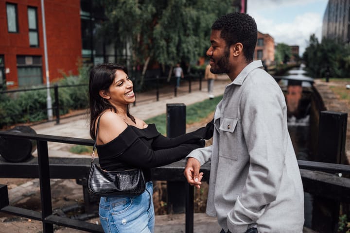 couple on romantic date by canal