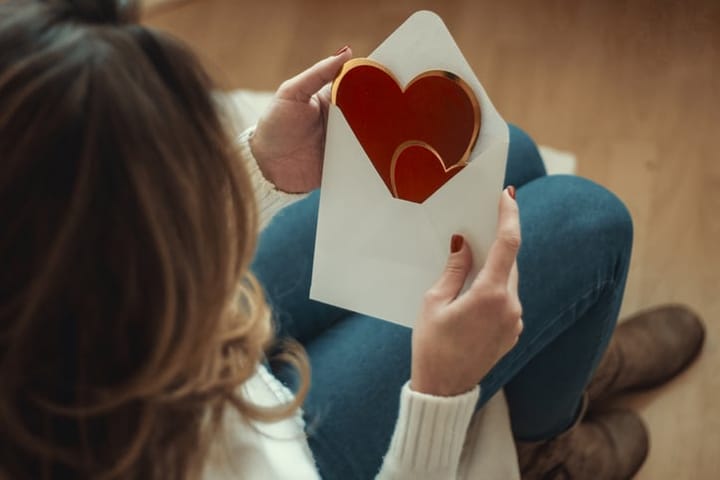 woman getting valentine's card