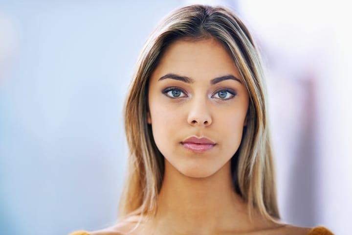 portrait of a woman staring straight ahead