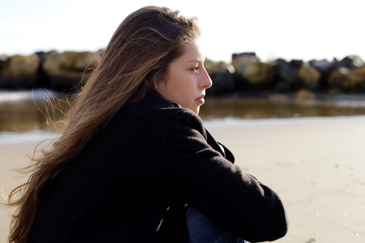 girl water sad portrait