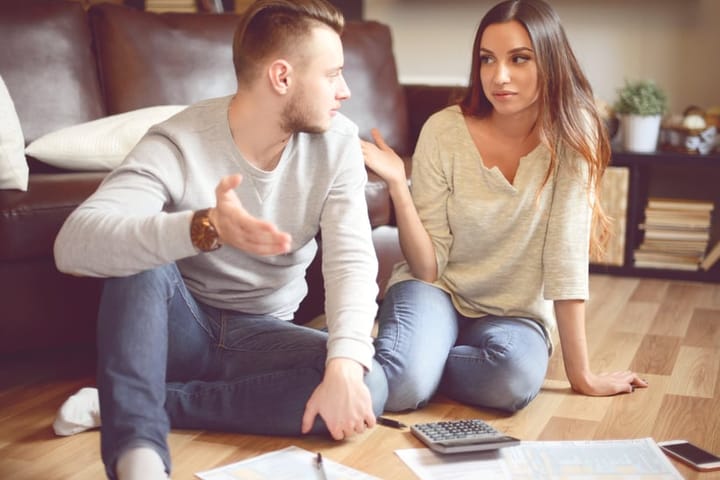 Young beautiful couple in home interior