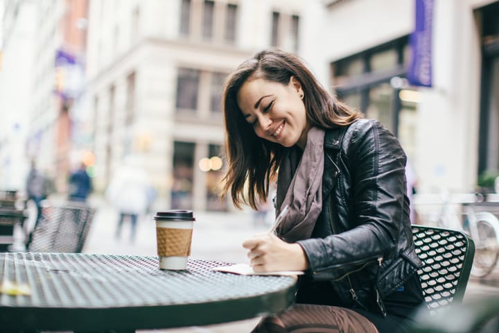 New York Woman Journaling in Park