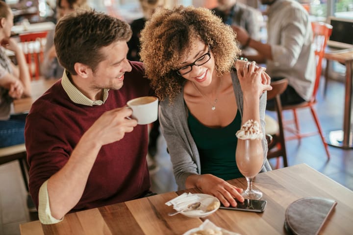 couple having coffee at restaurant